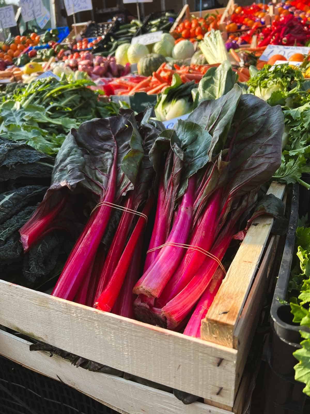 Swiss chard in a box at local market.
