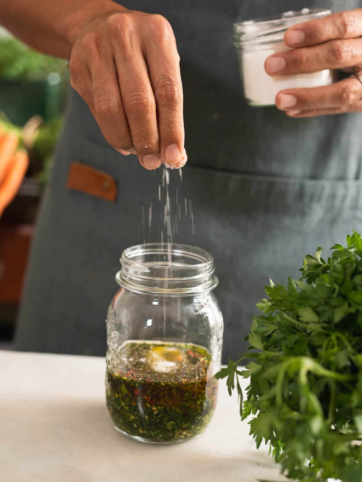 combining the carrot tops chimichurri directly in mason jar.