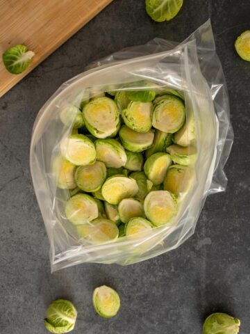 put the halved Brussels sprouts in a plastic ziplock bag.