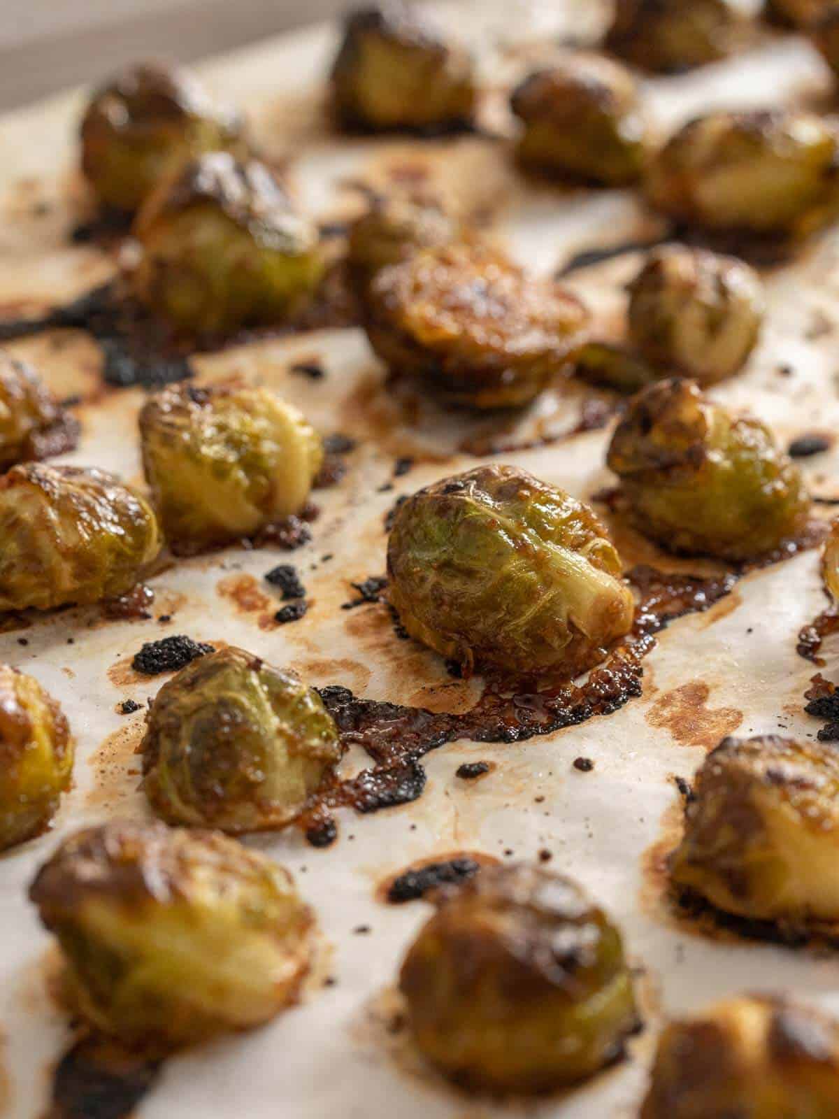 remove candied Brussels sprouts from the oven as soon as they are perfectly roasted.