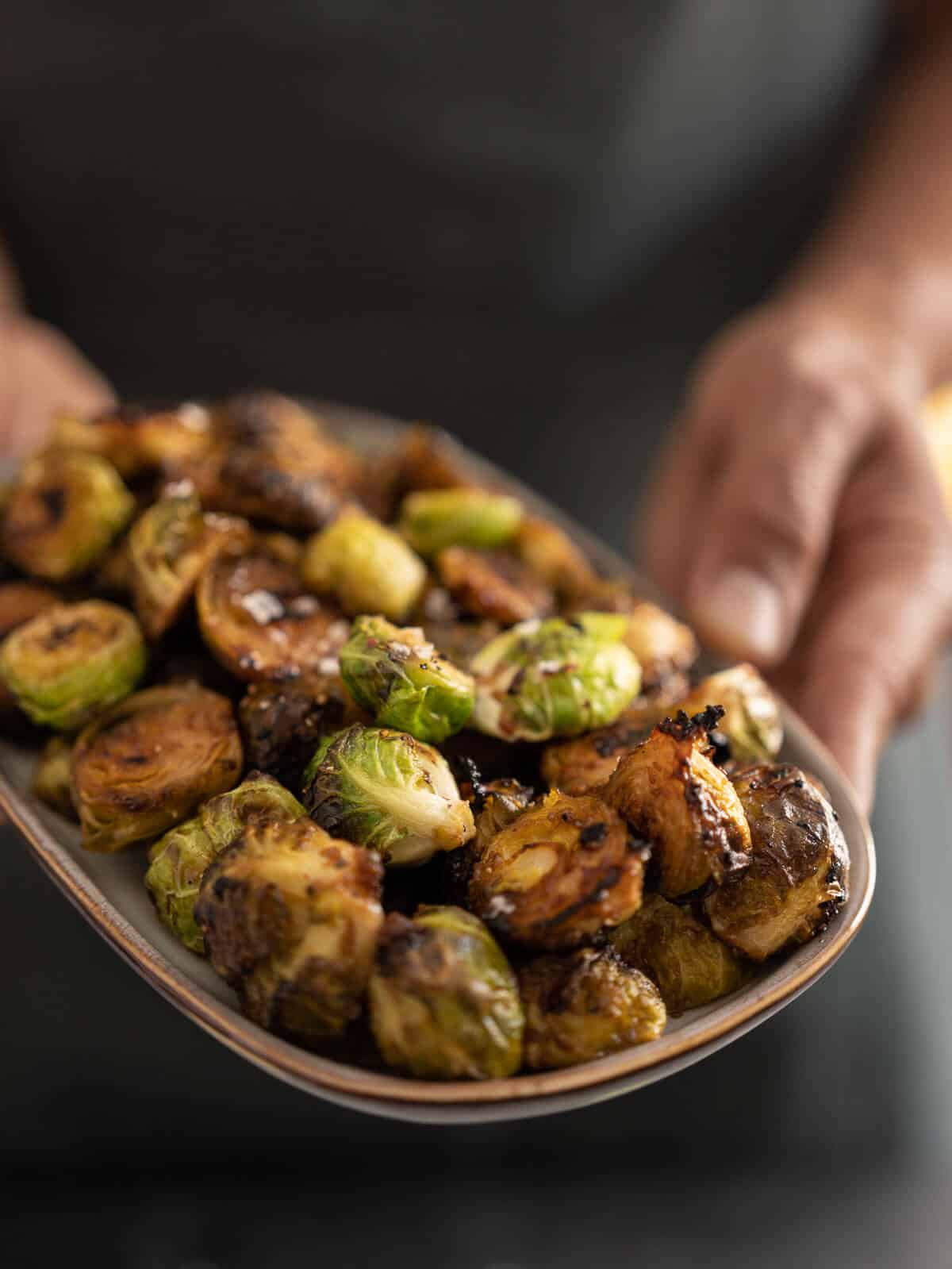 serve caramelized Brussels sprouts on small serving plates.