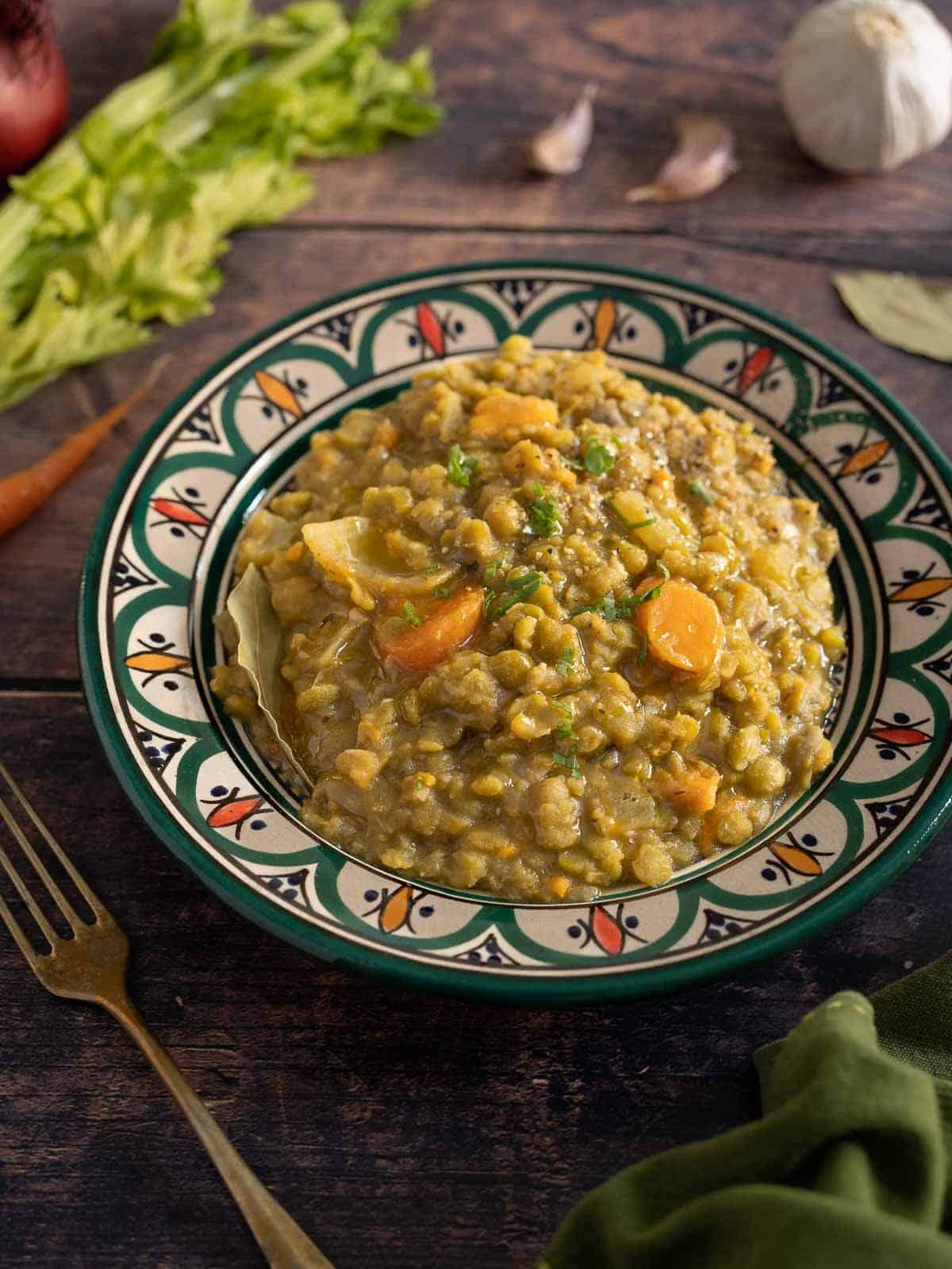 served pea pottage in a wooden table.