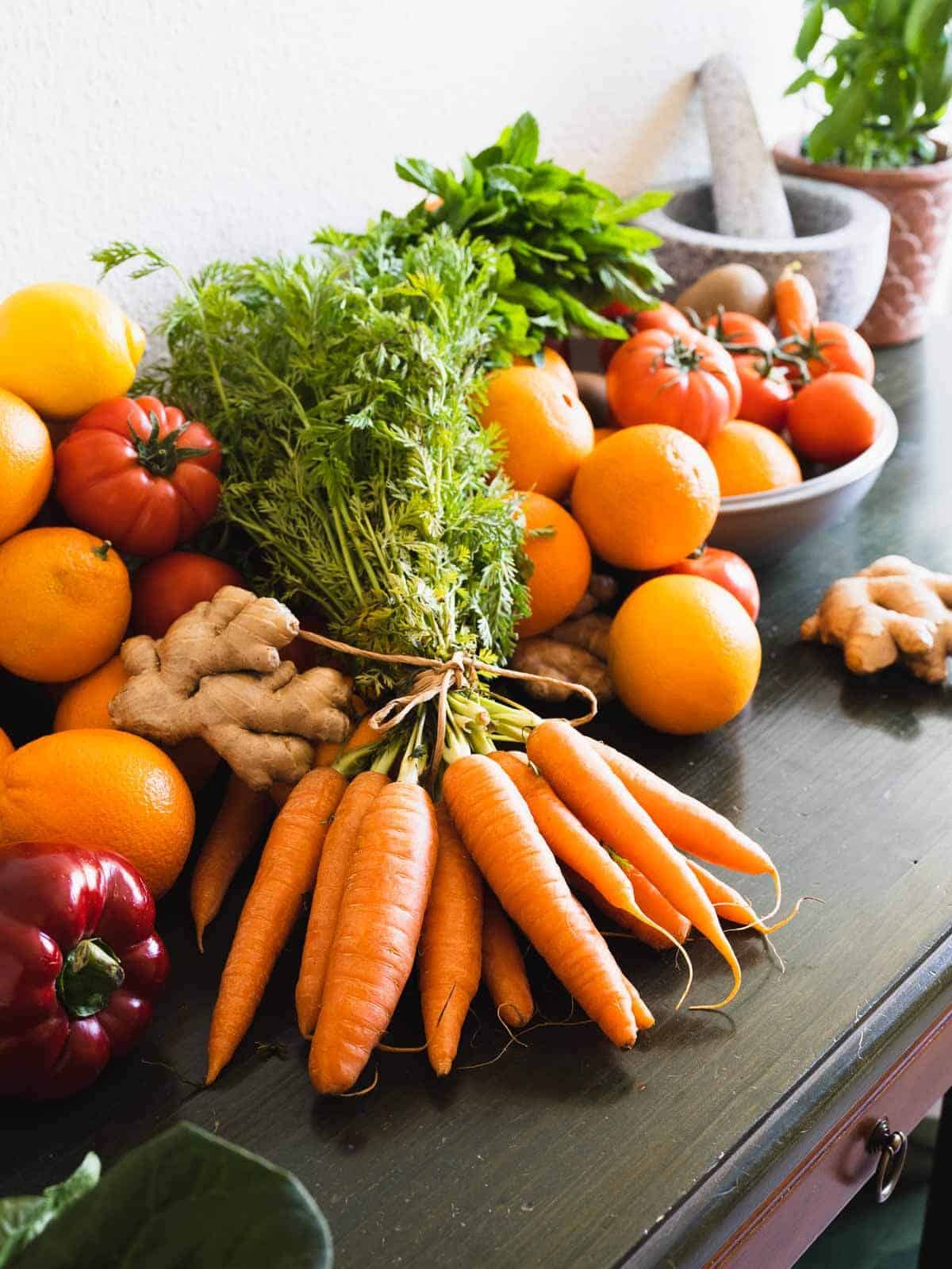 belly fat burning fruits and vegetables on a table.