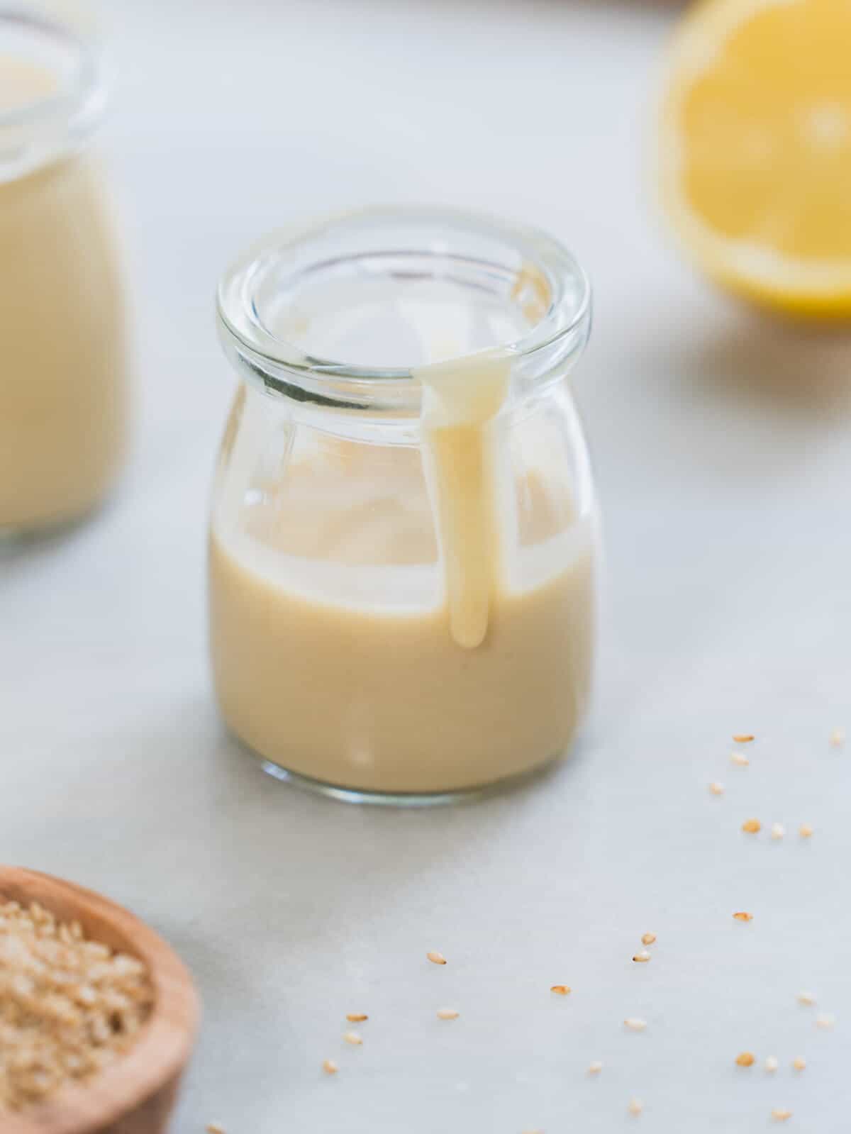 maple tahini dressing in jar.