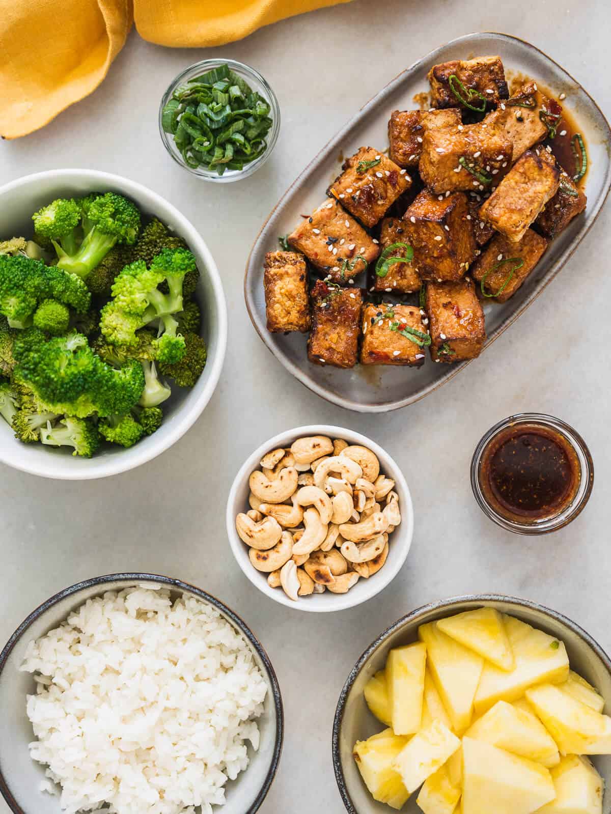 ingredients to make a tofu rice bowl with teriyaki tofu.