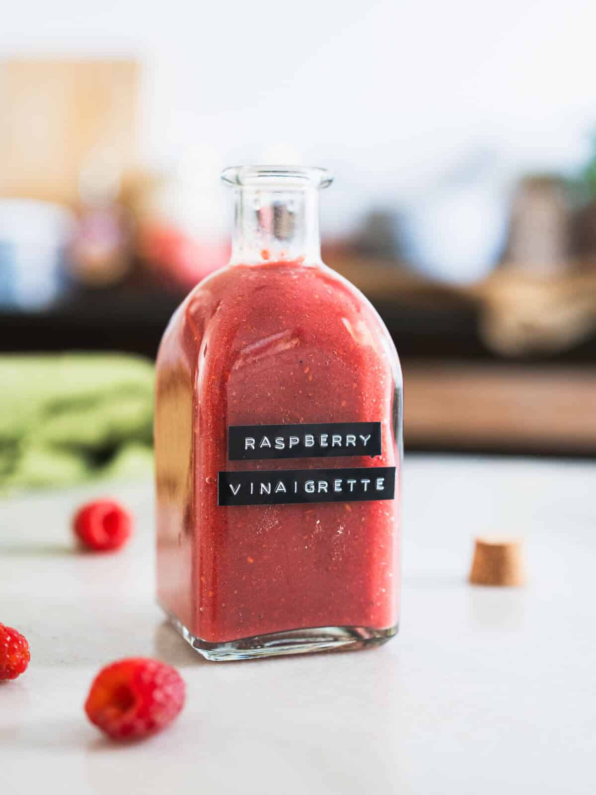 balsamic raspberry dressing bottled in a glass bottle.