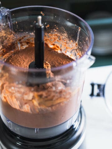 continue blending and adding almond milk one tablespoon at a time.