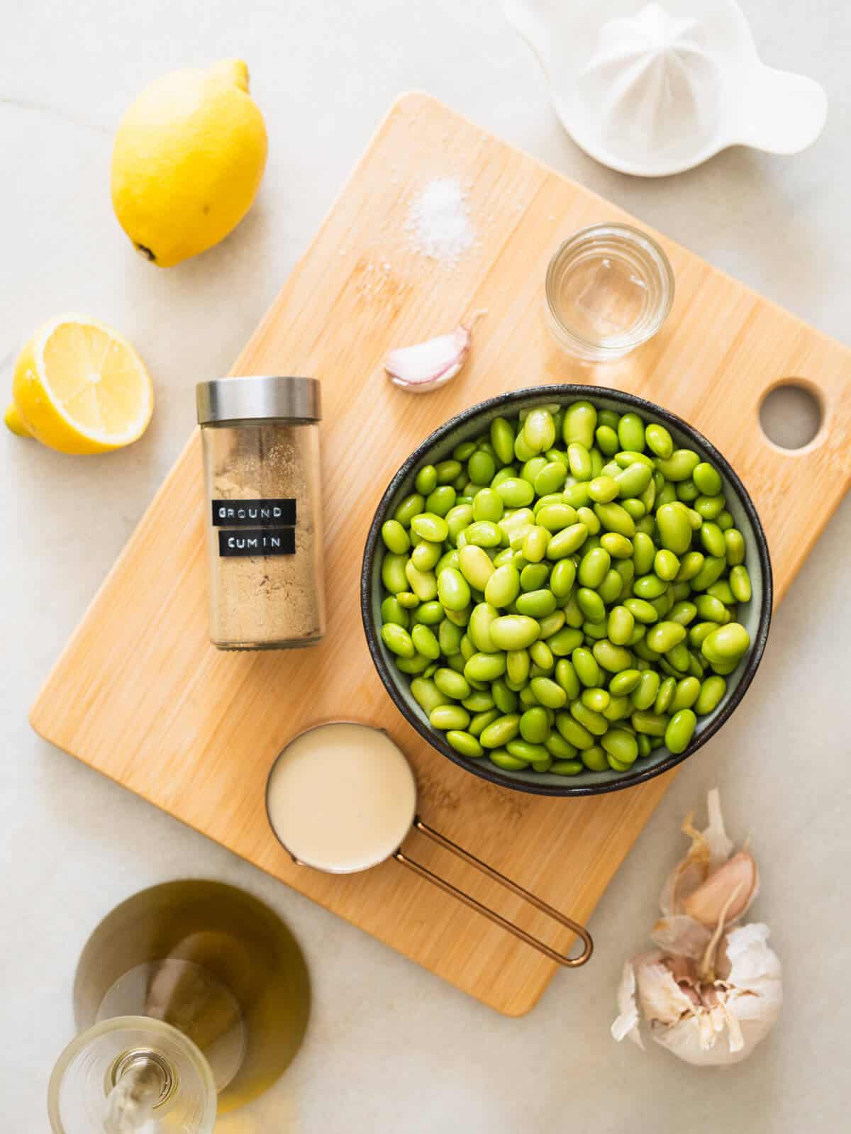 portioned ingredients to make edamame hummus.