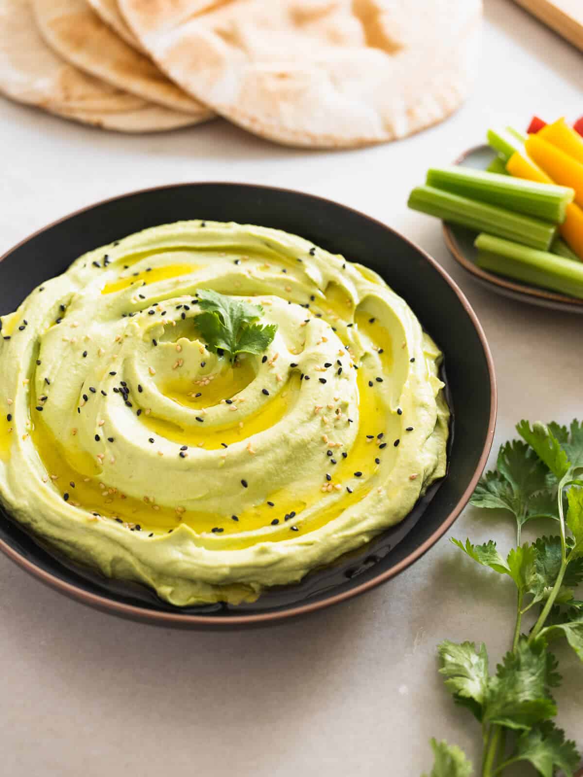 serve the edamame dip with raw vegetable sticks.