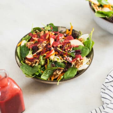 spinach walnut salad with apple and cranberry.