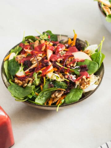 spinach walnut salad with apple and cranberry.