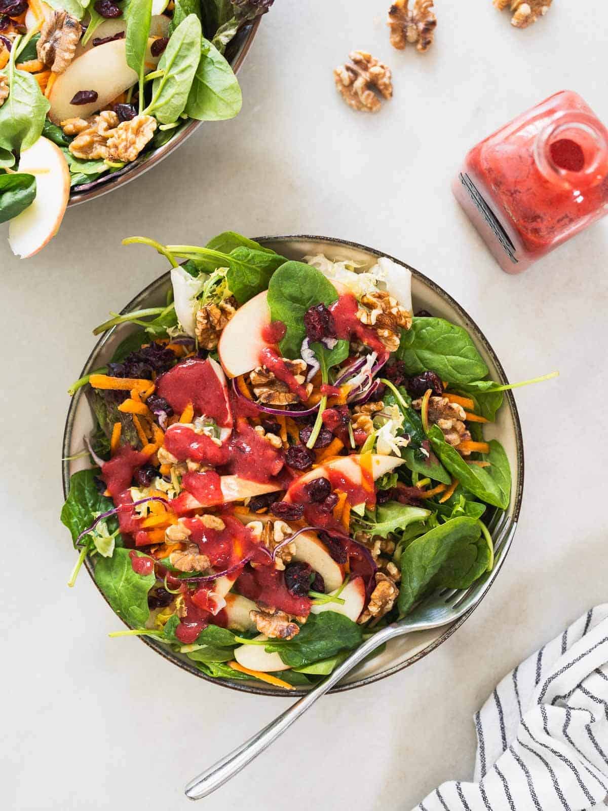 Spinach Apple Walnut Salad with raspberry vinaigrette.