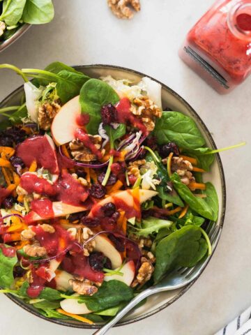 dress the salad with the raspberry dressing.
