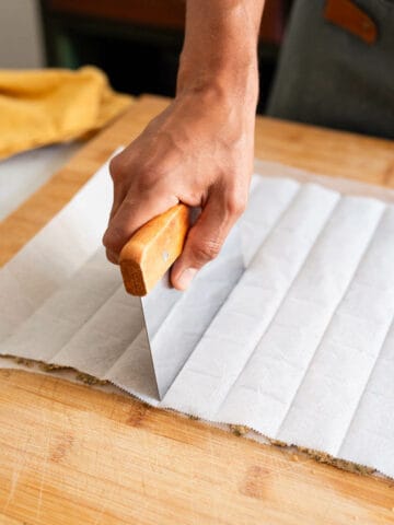 cutting dough into cracker-size.