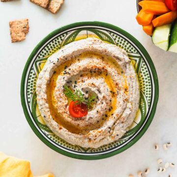 black-eyed peas hummus served in an Arab-style bowl.