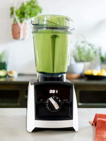 blending ingredients for avocado smoothie.