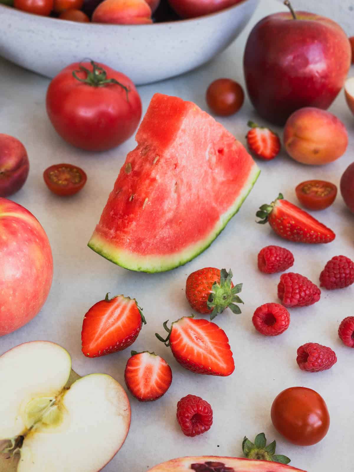 red berries and watermelon slice.