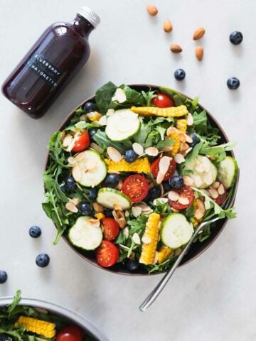 spinach and arugula salad with blueberry vinaigrette.