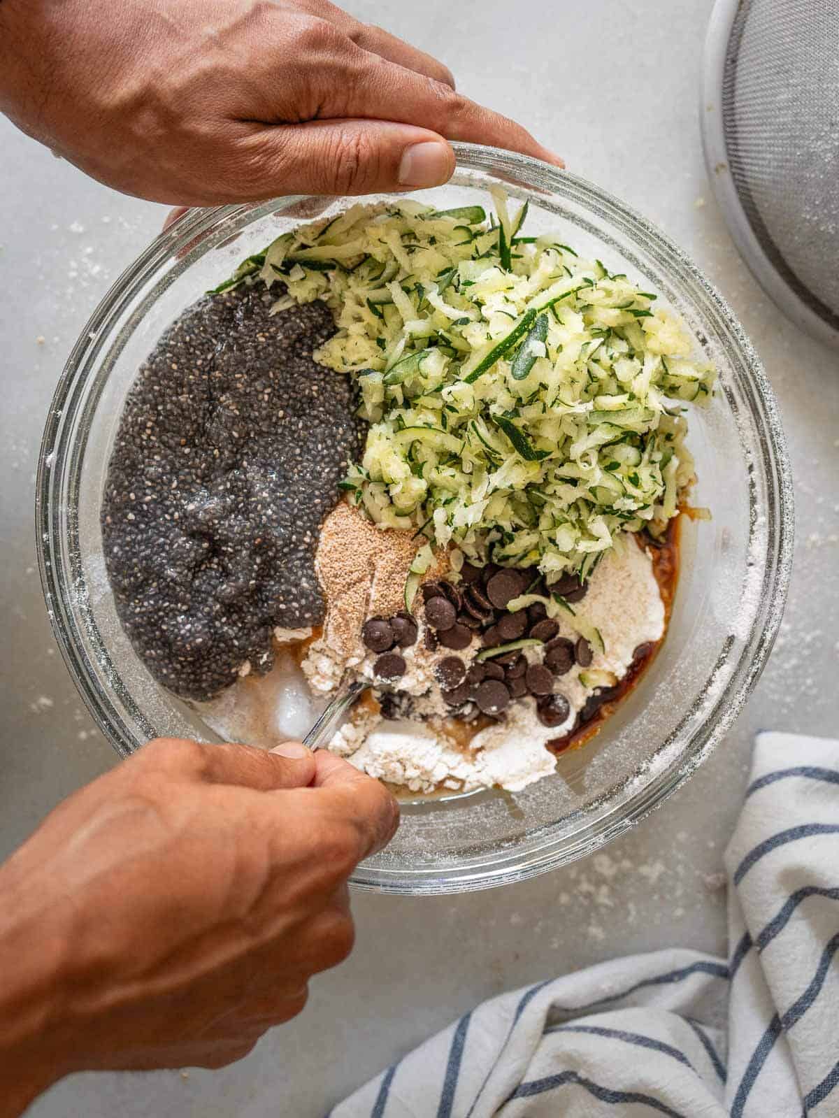 adding all the ingredients into the mixing bowl.