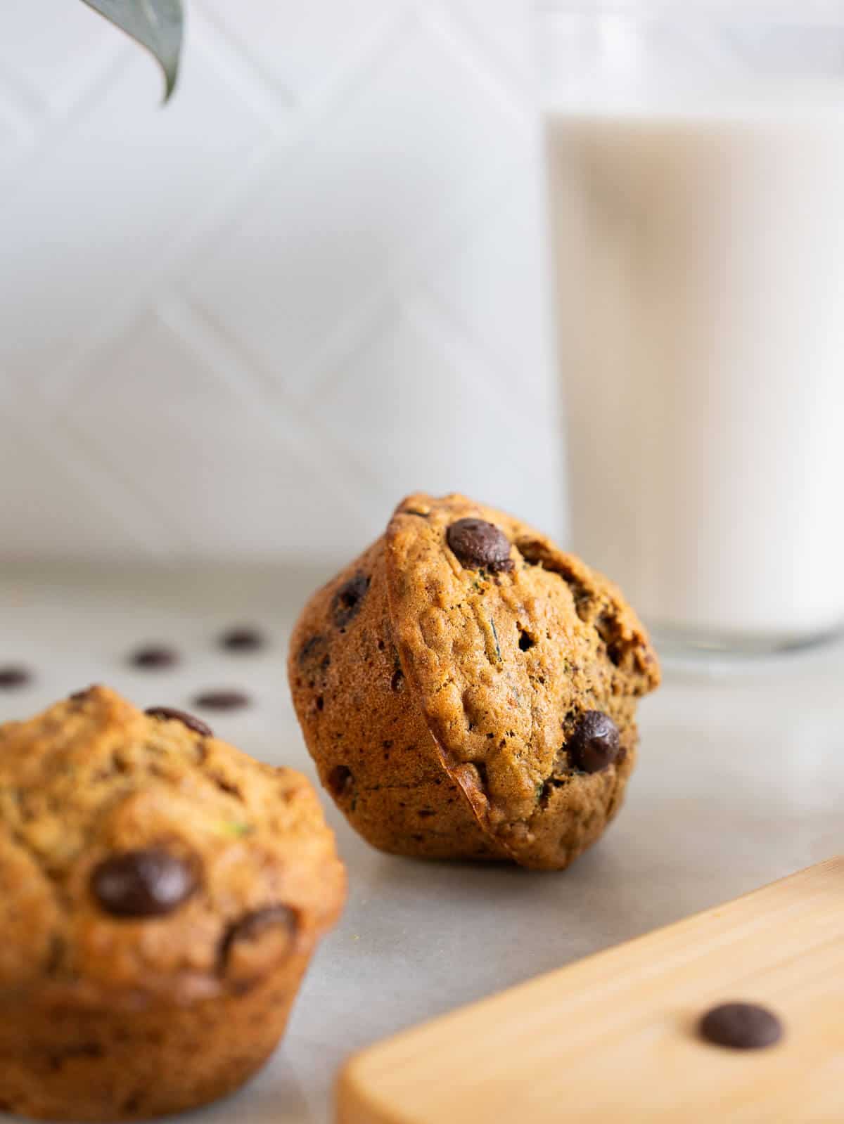 zucchini muffins with glass of plant-based milk for breakfast.