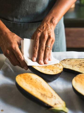 pat dry the eggplants with paper towels.