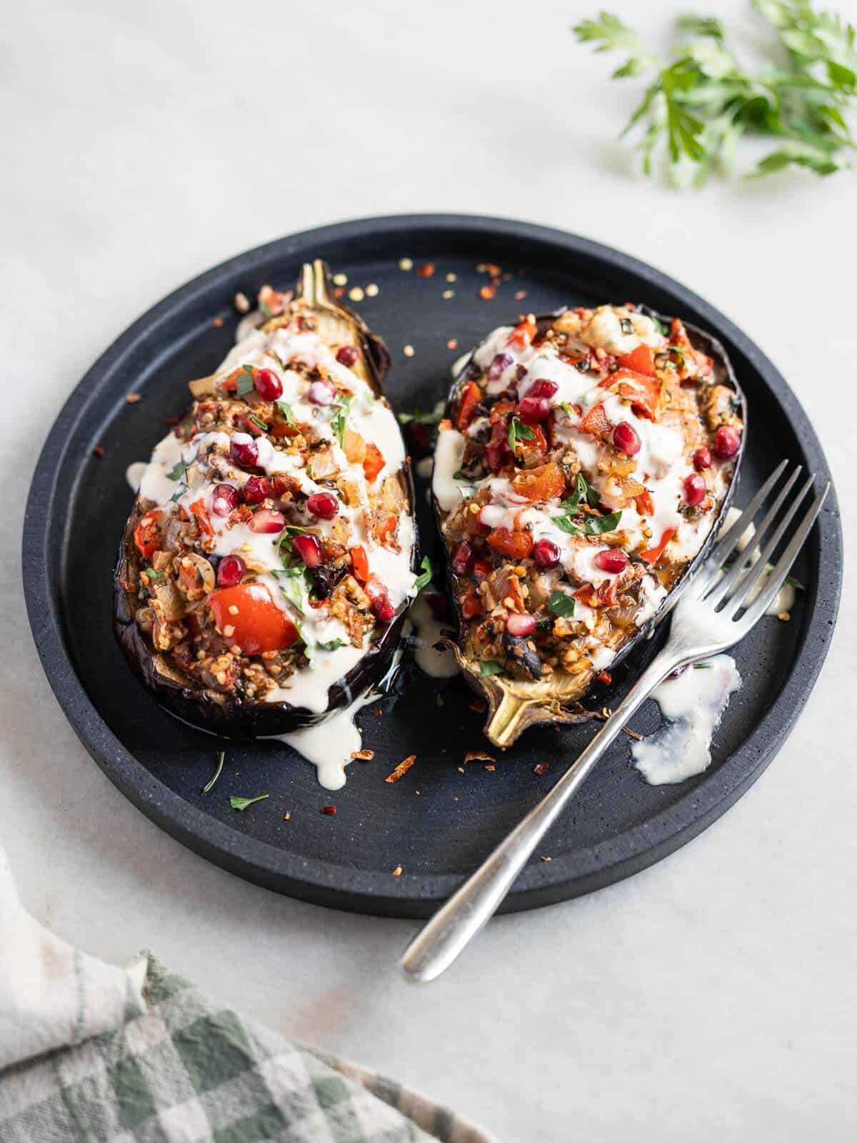 drizzle tahini sauce and op with chopped fresh parsley and pomegranate seeds.