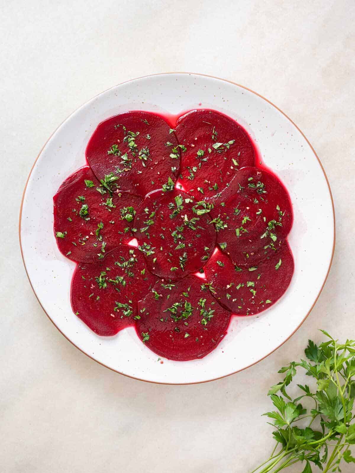 plate with beets sliced marinating.