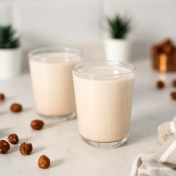 two glasses of hazelnut milk.