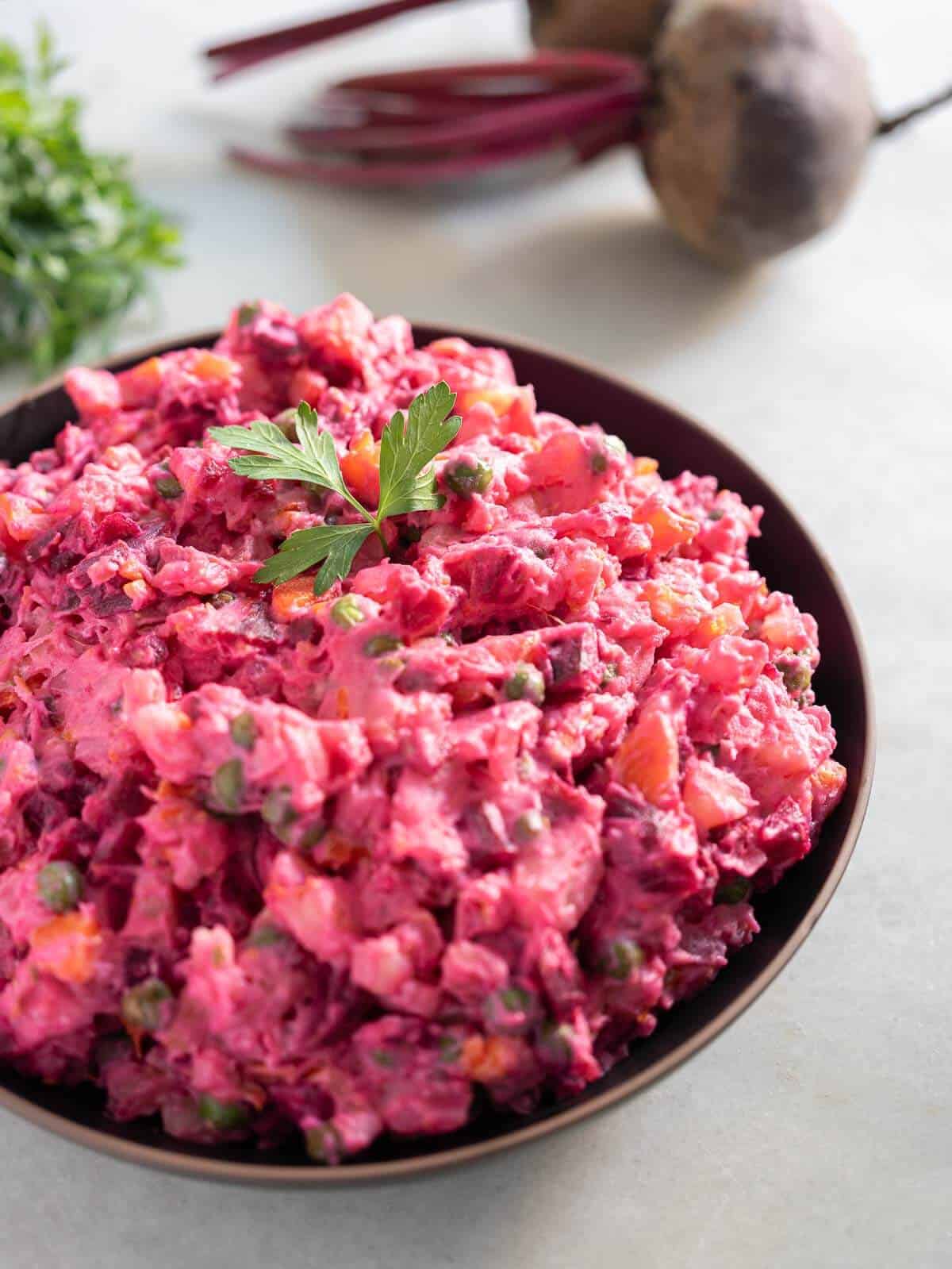 potato and beet salad served in a bowl.