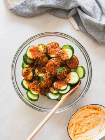 drizzle the cucumber salad dressing on top.