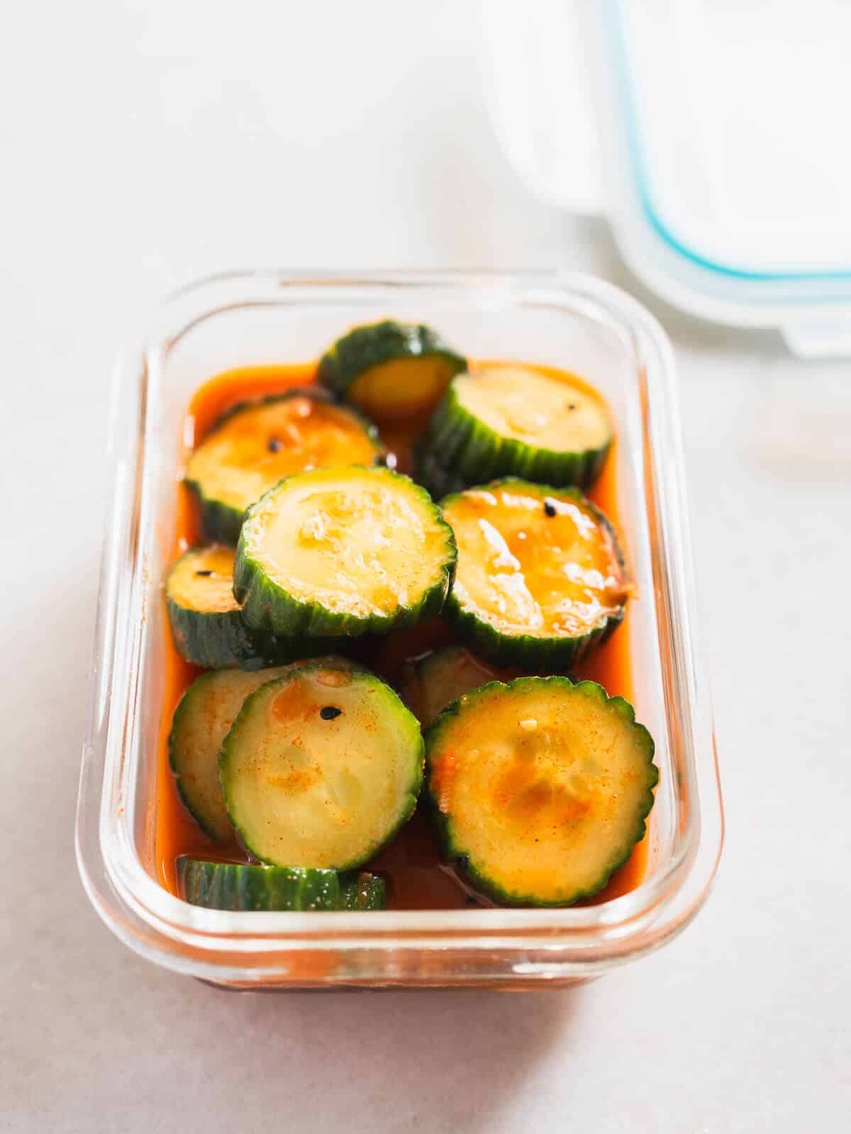 stored Korean spicy cucumber salad in a glass airtight container.