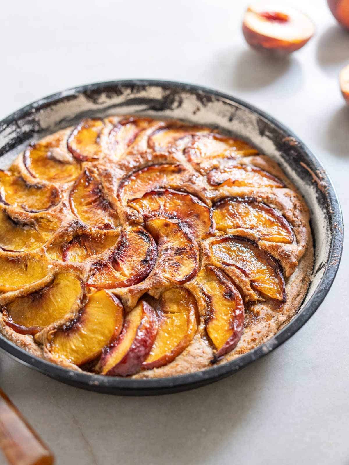 caramelized top of the brown sugar peach cake.