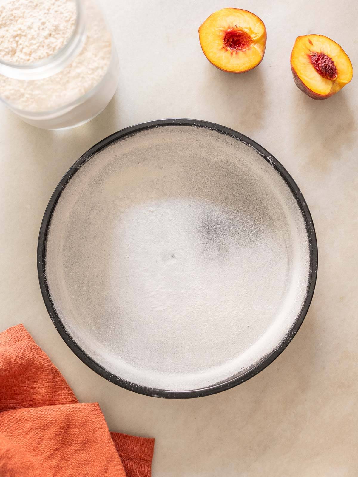 prepare baking dish with oil and dust flour to prevent the cake from sticking.