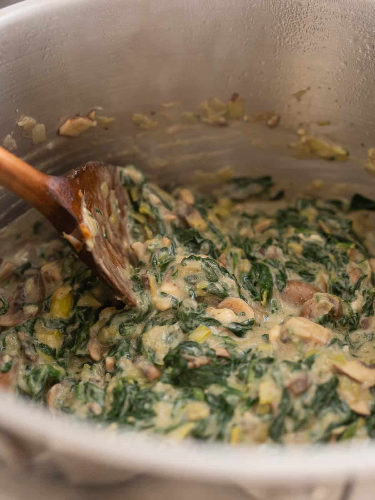 stir until a creamy spinach mushroom mixture is formed.