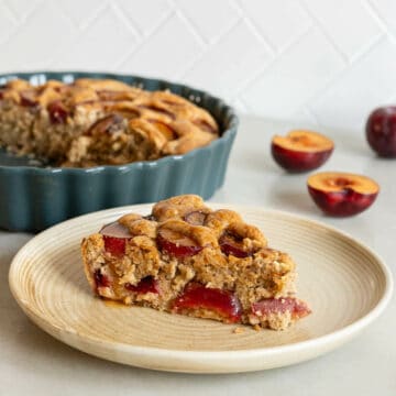 plum cake slice on small serving plate.