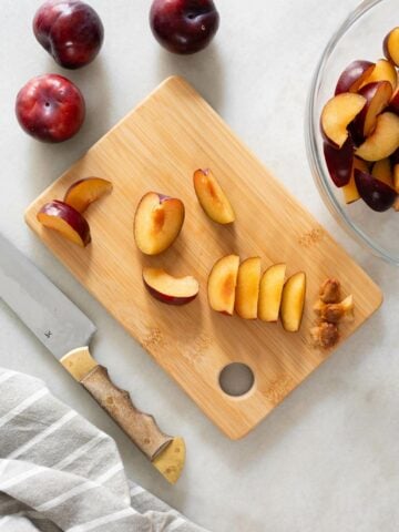 slice plums into wedges.
