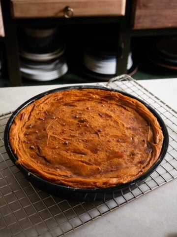 sweet potato pudding on cooling rack.