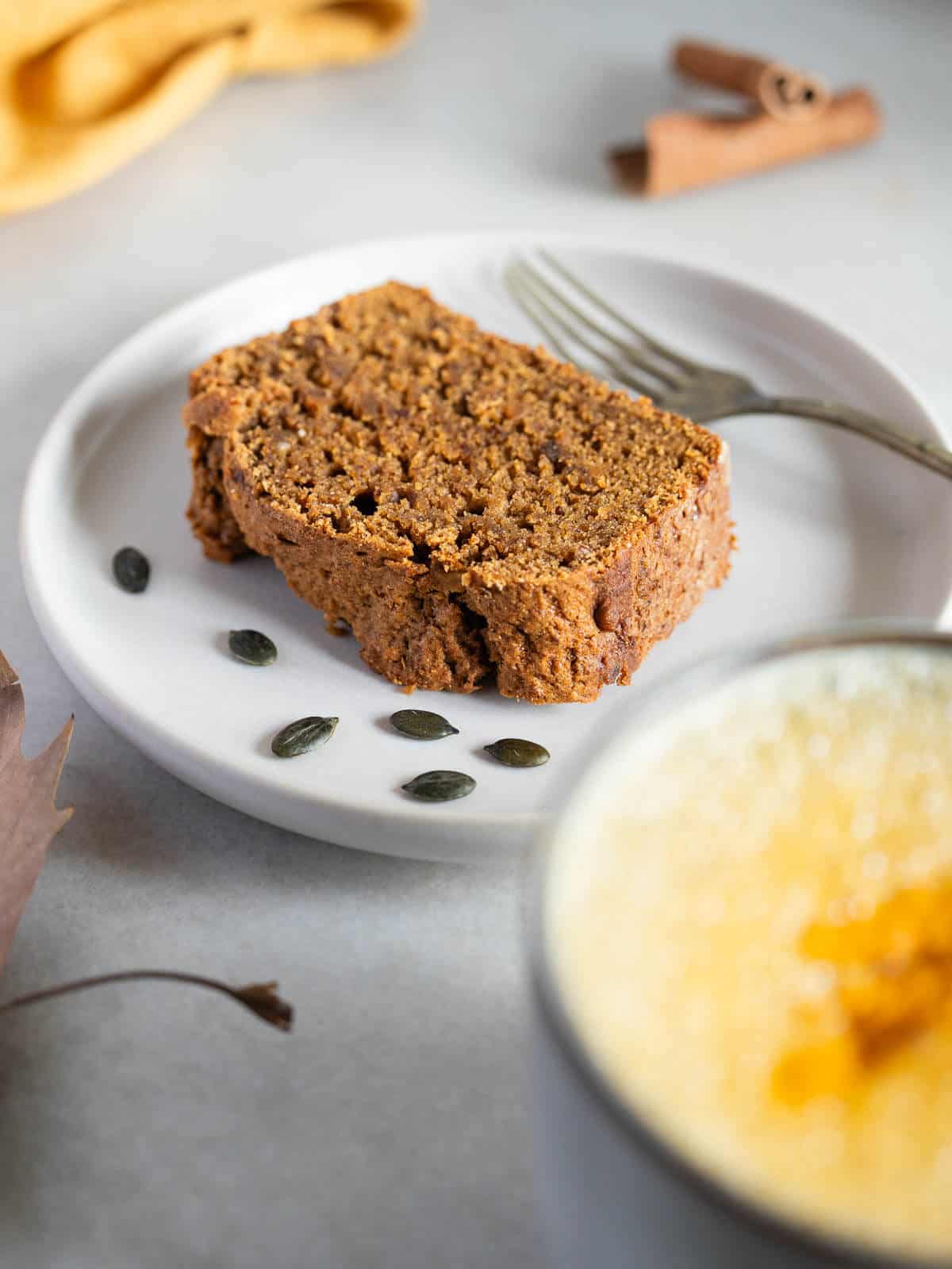 served slcied of pumpkin spice loaf cake.