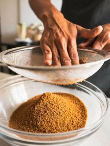 sifting coconut sugar.