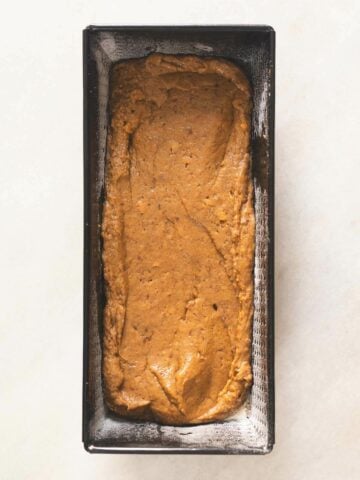 spread out the batter evenly into the loaf pan.