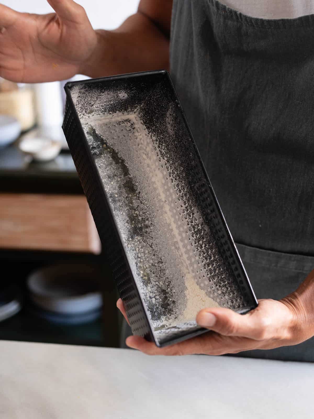 prepare a loaf pan with oil and flour.