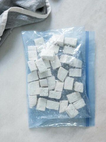 close the ziplock and carefully move the tofu cubes until they are perfectly coated.