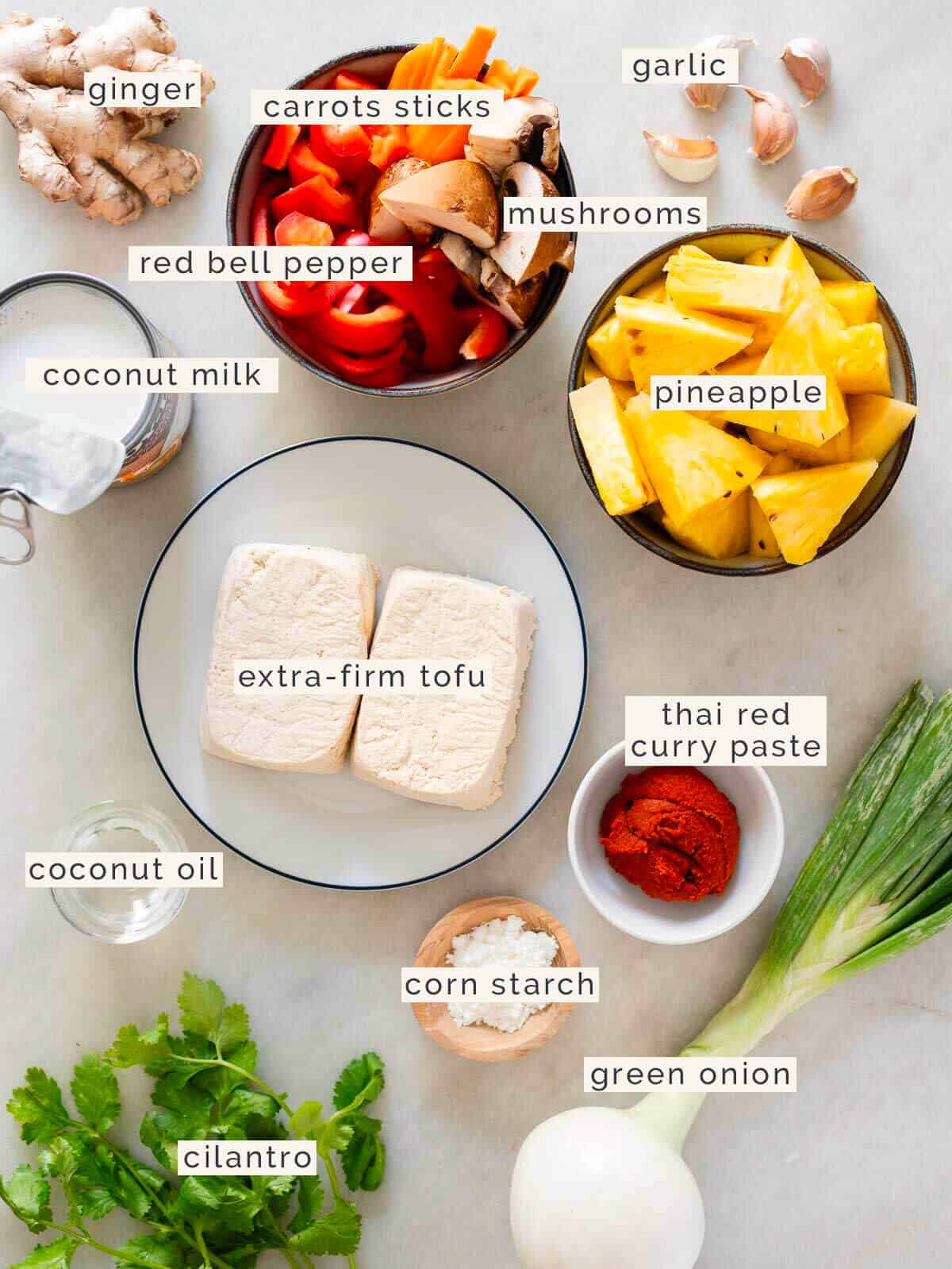 ingredients to make a coconut pineapple Thai curry.