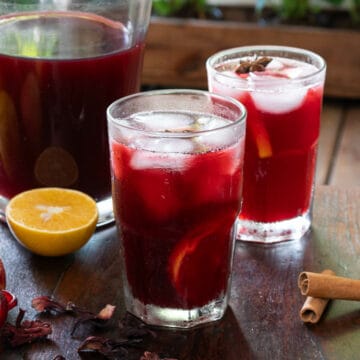 Caribbean sorrel drink served chilled with ice cubes.