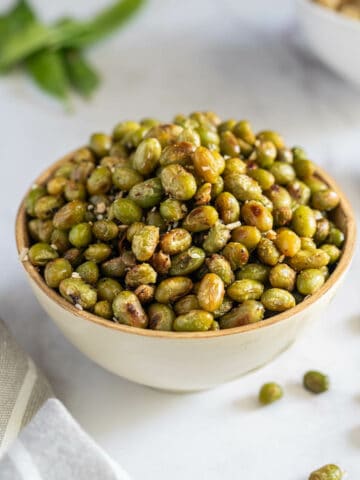 roasted edamame beans in a bowl ready for snacking.