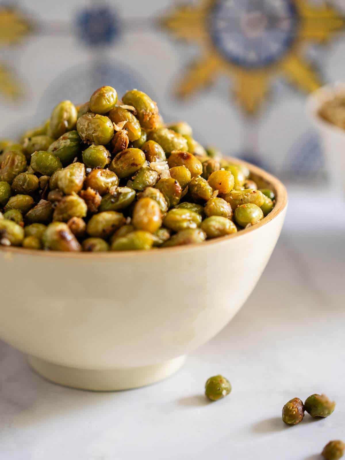 served roasted edamame beans in a small bowl.