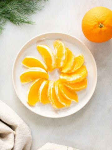 sliced oranges without white membranes.