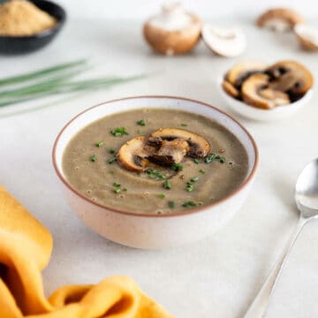 bowl served with mushrooms soup without cream.