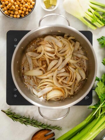 stir fry onions, garlic, and chopped fennel.