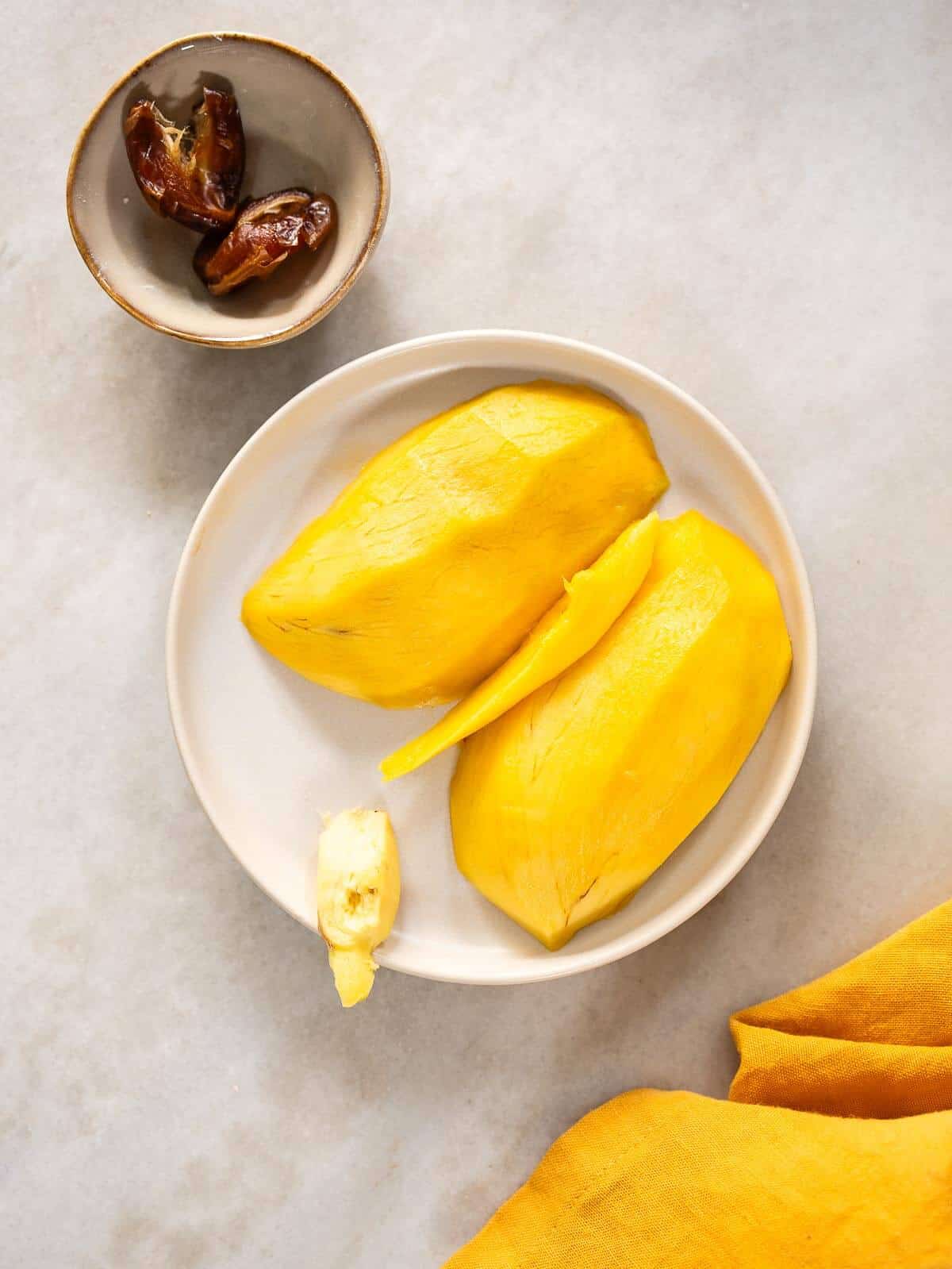 peeled mango and pitted dates.